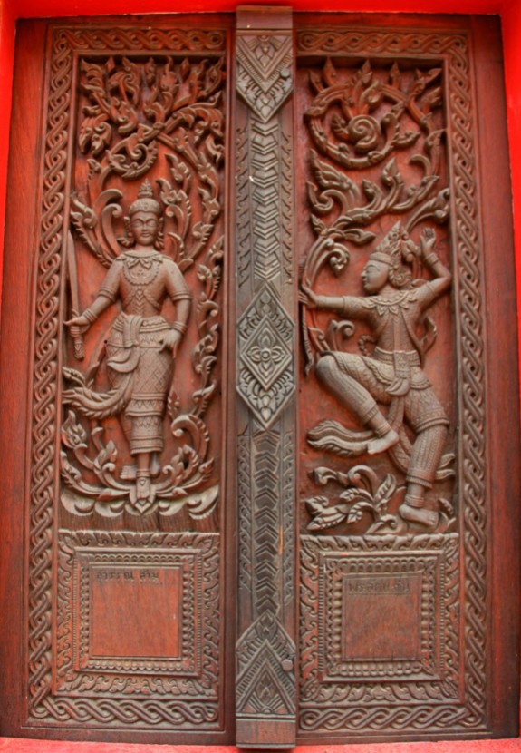 The door's Carvings on Temple in Wat Ban Na Muang, Ubon
